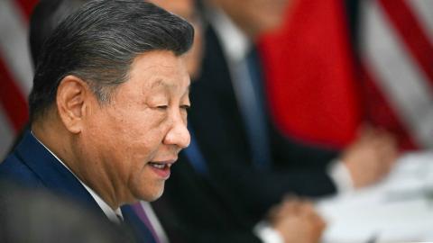 China's President Xi Jinping speaks during talks with US President Donald Trump at the Gimhae Air Base, in Busan on October 30, 2025. (Getty Images)