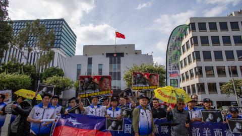 Caption People gather in front of the Chinese Consulate General to protest the unjust conviction of media entrepreneur Jimmy Lai on February 14, 2026, in Los Angeles, California. (Getty Images) Share to Twitter