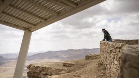 A visitor looks at the view at Ramon Crater in Negev desert of southern Israel on March 15, 2026. (Getty Images)