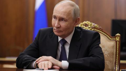 Russian President Vladimir Putin looks during a meeting at the Kremlin in Moscow late on April 29, 2026. (Getty Images) Share to Twitter