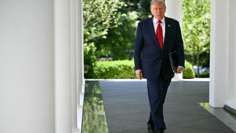 Caption US President Donald Trump exits the Oval Office in Washington, DC, on May 8, 2026. (Getty Images)