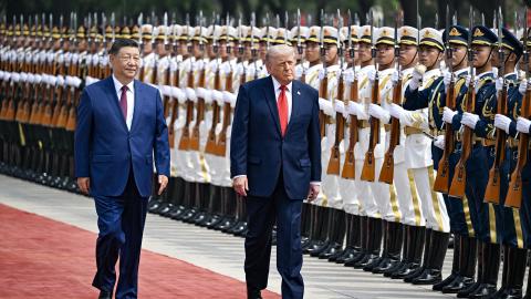 President Donald Trump and Xi Jinping inspect a guard of honour during a welcome ceremony at the Great Hall of the People in Beijing on May 14, 2026. (Getty Images) Share to Twitter