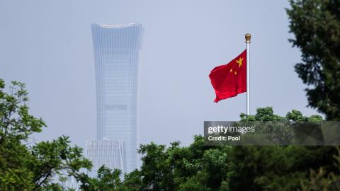  China's national flag flutters in the wind next to the CITIC tower ahead of Brunei's Crown Prince Al-Muhtadee Billah and China's President Xi Jinping meeting on May 12, 2026 in Beijing, China. (Photo by Maxim Shemetov Pool/Getty Images)