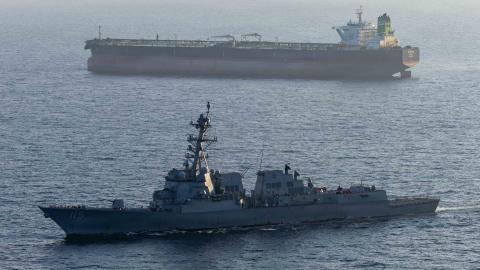 The USS Rafael Peralta implements a maritime blockade against an Iranian-flagged ship attempting to sail toward an Iranian port on April 26, 2026. (US Navy)