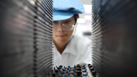 Caption A worker produces integrated circuit products in a workshop in Weihai, Shandong Province, China, on September 9, 2025. (Getty Images) Share to Twitter