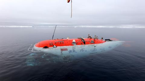 China’s manned deep-sea submersible Jiaolong is lowered into the Arctic Ocean on August 6, 2025. (Getty Images)