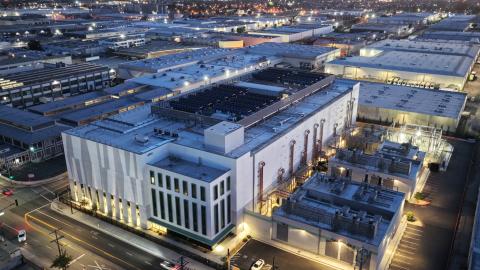 An aerial view of a 33 megawatt data center (C) with closed-loop cooling system on April 14, 2026 in Vernon, California. A surge in demand for AI infrastructure is fueling a boom in data centers across the country and around the globe. (Photo by Mario Tama/Getty Images)