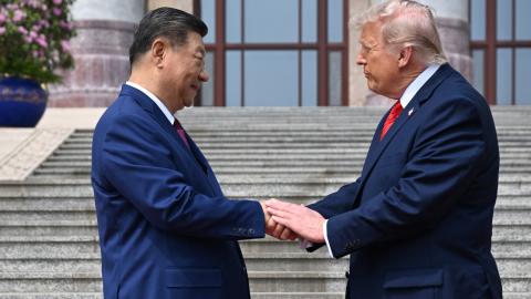 resident Donald Trump shakes hands with China's President Xi Jinping at the Great Hall of the People in Beijing on May 14, 2026. (Getty Images)