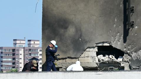 Police and forensic investigators examine the location of impact after a Russian drone struck an apartment building in Galati, eastern Romania. on May 29, 2026. (Getty Images)