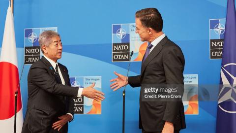 Minister of Foreign Affairs of Japan Takeshi Iwaya (L) meets NATO Secretary General Mark Rutte (R) at the NATO summit on June 24, 2025 in The Hague, Netherlands. This year's NATO summit, which brings together heads of state and government from across the military alliance, is being held in the Netherlands for the first time. Among other matters, members are to approve a new defense investment plan that raises target for defense spending to 5% of GDP. (Photo by Pierre Crom/Getty Images)