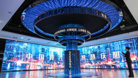 A staff member briefs on the East Data, West Computing initiative at a data center in Qingyang, China, on January 6, 2025. (Getty Images)