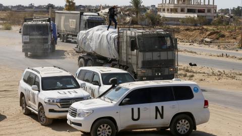 Trucks carrying food and fuel enter the Gaza Strip through the Kissufim Crossing in central Gaza, accompanied by a United Nations team, on October 17, 2025. (Getty Images)