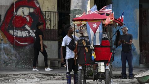 A tricycle decorated with US and Cuban flags is seen in Havana on June 15, 2026. (Getty Images) Share to Twitter
