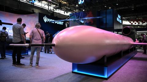 This photograph shows an FP-5 Flamingo cruise missile and a drone FP-1 from Ukrainian defence technology company Fire Point on display at Eurosatory, a land and airland defence and security trade fair, in Villepinte on the outskirts of Paris, on June 16, 2026. (Photo by JULIEN DE ROSA / AFP via Getty Images)