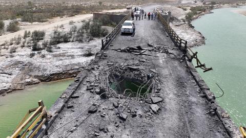 A hole is visible in a damaged bridge following US air strikes carried out a day earlier in the southern Hormozgan Province, Iran, on July 17, 2026. (Getty Images)