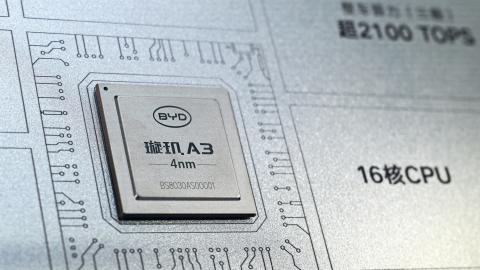 A Xuanji A3 chip is pictured at the BYD booth during the World Artificial Intelligence Conference (WAIC) in Shanghai on July 18, 2026. (Photo by Hector RETAMAL / AFP via Getty Images)