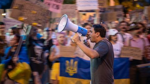 People attend a rally to protest the dismissal of defense minister of Ukraine Mykhailo Fedorov in Kyiv, Ukraine, on July 20, 2026. (Getty Images)