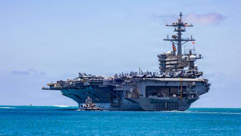 The aircraft carrier USS Theodore Roosevelt departs Joint Base Pearl Harbor-Hickam in Hawaii during Exercise Rim of the Pacific on July 7, 2026. (DVIDS)