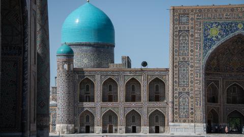 On April 10, 2025, international tourists and Uzbek locals visit historic attractions in Samarkand, Uzbekistan, an ancient Silk Road city with many mosques, madrasas, and mausoleums. Above, visitors explore Registan Square. (Photo by Diego Cupolo/NurPhoto via Getty Images)