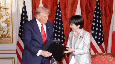 President Donald Trump and Japanese Prime Minister Sanae Takaichi exchange documents at the Akasaka Palace on October 28, 2025, in Tokyo, Japan. (Getty Images)