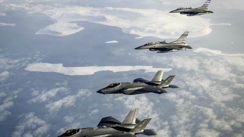 North American Aerospace Defense Command F-35 Lightning II aircraft with the Wisconsin Air National Guard and F-16 Fighting Falcon aircraft with the South Carolina Air National Guard fly over Greenland on October 7, 2025. (US Air National Guard)