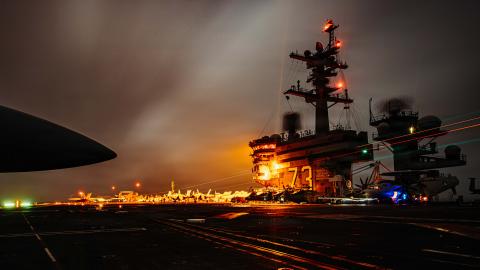An F/A-18 Super Hornet lands on the flight deck of the USS George Washington on August 29, 2026, in the US 5th Fleet area of operations while supporting maritime security and stability in the Middle East. (US Navy)