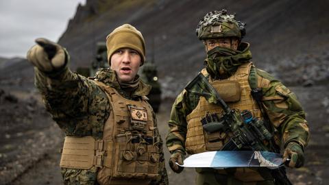 U.S. Marine Corps 1st Lt. Joel Murcek, a fire support coordinator with Fire Support Battalion, 10th Marine Regiment, coordinates displacement tactics with Norwegian Home Guard soldiers with 3rd Platoon, District 11, in Jan Mayen, Norway, Sept. 1, 2026. This bilateral planning, conducted during Operation Atlantic City 26, is crucial for integrating movement and security procedures, ensuring U.S. and Norwegian forces can operate seamlessly in the High North. Atlantic City 26 is a Norwegian-led trilateral read