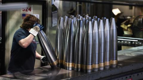 An employee handles 155 mm caliber shells after the manufacturing process at the Scranton Army Ammunition Plant (SCAAP) in Scranton, Pennsylvania, on April 16, 2024. (Getty Images)