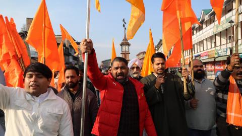 Leaders and members of the Rashtriya Swayamsevak Sangh (RSS) carry party flags during a rally in Srinagar, Jammu and Kashmir, on February 6, 2026. (Getty Images)