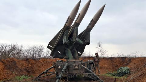 A serviceman of the 208th Kherson Anti-Aircraft Missile Brigade, which performs air defense missions in the southern direction, stands on combat duty near a launcher of the MIM-23 Hawk surface-to-air missile system, Mykolaiv region, Ukraine, on March 30, 2026 (Photo by Nina Liashonok/Ukrinform) (Photo credit should read Nina Liashonok/ Ukrinform/Future Publishing via Getty Images)