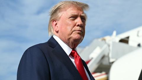 President Donald Trump speaks to reporters before boarding Air Force One at Joint Base Andrews, Maryland, on August 21, 2026. (Getty Images)
