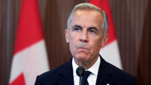 Canadian Prime Minister Mark Carney speaks at a press conference in Ottawa, Ontario, on August 22, 2026, after trade talks with the US collapsed. (Getty Images)