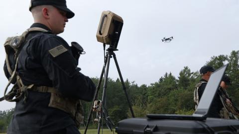 A member of the US Army 7th Army Training Command stands with a radar for drone detection during a demonstration at the US Army Joint Multinational Readiness Center on August 26, 2026, near Hohenfels, Germany. (Getty Images)