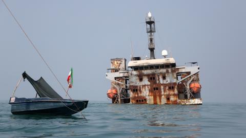 An Iranian Revolutionary Guard Corps Navy warship struck by a US missile lies off the coast of Bandar Abbas, Iran, on September 9, 2026. (Getty Images)