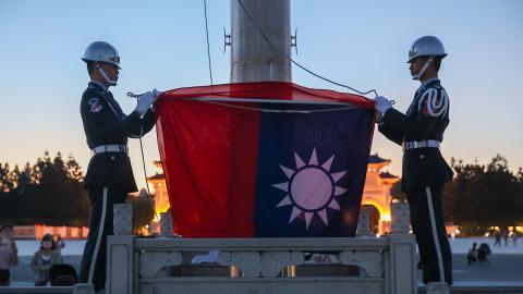 Taiwanese honor guards participate in a flag-lowering ceremony at the Liberty Square in Taipei, Taiwan, on September 23, 2026. (Getty Images)