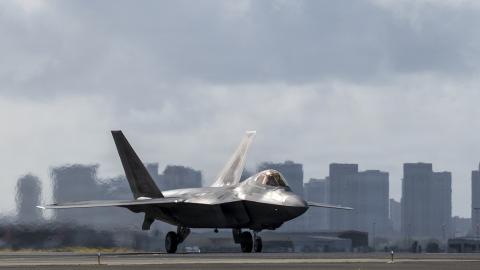 A U.S. Air Force F-22 Raptor taxis from the runway at Joint Base Pearl Harbor-Hickam, Honolulu, Hawaii, after integration operations with two B-2 Spirit stealth bombers during a Bomber Task Force deployment, July 1, 2026. The integration of the B-2 with 5th-generation fighter aircraft demonstrates U.S. stealth capabilities and assures allies of our enduring commitment to regional security. (U.S. Air National Guard photo by Tech. Sgt. Whitney Erhart) Read less