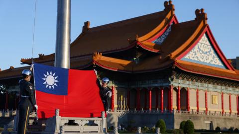 Guards raise Taiwan’s national flag at the Chiang Kai-shek Memorial Hall in Taipei on October 15, 2024. (Getty Images)