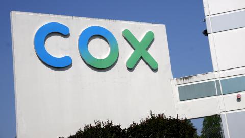 A Cox sign is seen on the Cox Communications Springfield Warehouse on May 16, 2025, in Springfield, Virginia. (Getty Images)