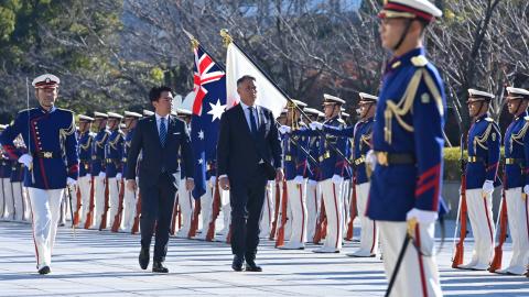 Japan's Defence Minister Shinjiro Koizumi (L) and Australia's Defence Minister Richard Marles review honour guards during a welcome ceremony at the Ministry of Defense in Tokyo on December 7, 2025. (Photo by David Mareuil / POOL / AFP via Getty Images)