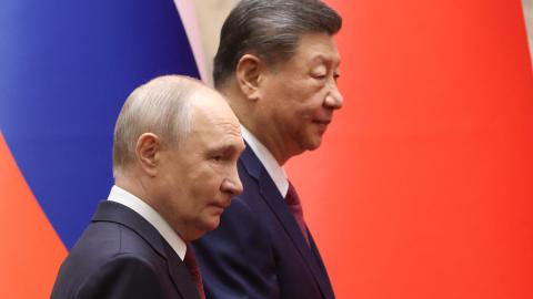 Russian President Vladimir Putin and Chinese President Xi Jinping enter the hall during a signing ceremony on May 20, 2026, in Beijing, China. (Getty Images)