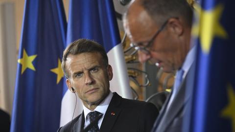 France’s President Emmanuel Macron looks on as German Chancellor Friedrich Merz speaks during a joint press conference at Augustusburg Castle during the 26th German-French cabinet in Bruehl, Germany, on July 17, 2026. (Getty Images)