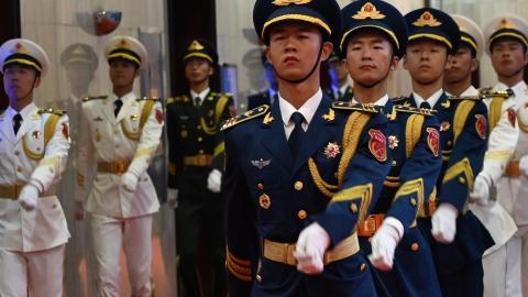 Soldiers from the Chinese People’s Liberation Army prepare for the opening ceremony of the Beijing Xiangshan Forum on security dialogue on September 16, 2026. (Getty Images)