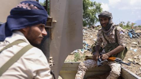 Saudi-backed Yemen government soldiers gather near the Jabal Han front, west of the city of Taiz, following fierce battles earlier in the day as Yemen's Houthis reportedly attempted to seize control of the main route between the inland city of Taiz and the coastal city of Aden, on October 3, 2026. The civil war, which dates to 2014 but had been dormant following a truce in 2022 roared back to life in July, as the wider Middle East war ignited another front. The Houthis, a predominantly Zaidi Shia group whos