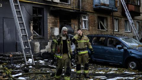 Rescuers work outside a damaged five-story residential building following a Russian drone attack in Kyiv on October 7, 2026, amid the Russian invasion of Ukraine. (Getty Images)