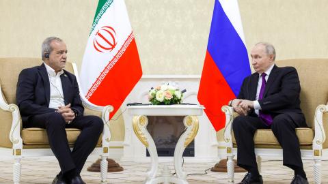 Russia's President Vladimir Putin and Iranian President Masoud Pezeshkian hold a meeting in Turkmenbashi on October 8, 2026. (Getty Images)