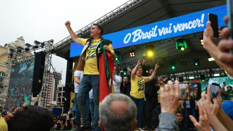 Brazil’s Liberal Party presidential candidate Flavio Bolsonaro greets supporters during a rally at Largo Glenio Peres in Porto Alegre, Brazil, on October 14, 2026. (Getty Images)