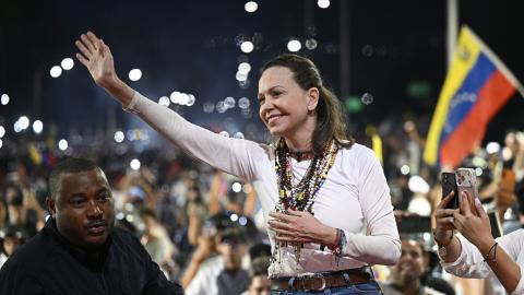 Venezuelan opposition leader and Nobel Peace Prize laureate Maria Corina Machado greets supporters upon her arrival in Caracas on October 25, 2026. (Getty Images)