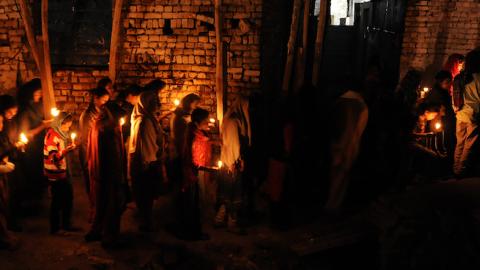 Pakistani Christians hold candles as they march during the Easter Celebration ceremony on April 20, 2014 in Islamabad, Pakistan. (Metin Aktas/Anadolu Agency/Getty Images)