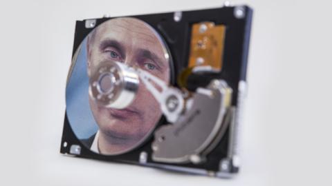 A computer hard drive showing the portrait of Russian President Putin (Ulrich Baumgarten/Getty Images)