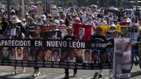 Relatives of missing persons marched in Mexico City on May 10, 2015, demanding the government provide information on the disappearance of their children (YURI CORTEZ/AFP/Getty Images)